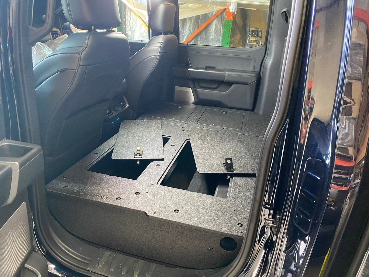 Ford - F150 2021 - Present - 14th Gen. SuperCrew - Second Row Seat Delete Plate System with Factory B&O Subwoofer Center Wall with Exterior Port - Xtrusion Overland