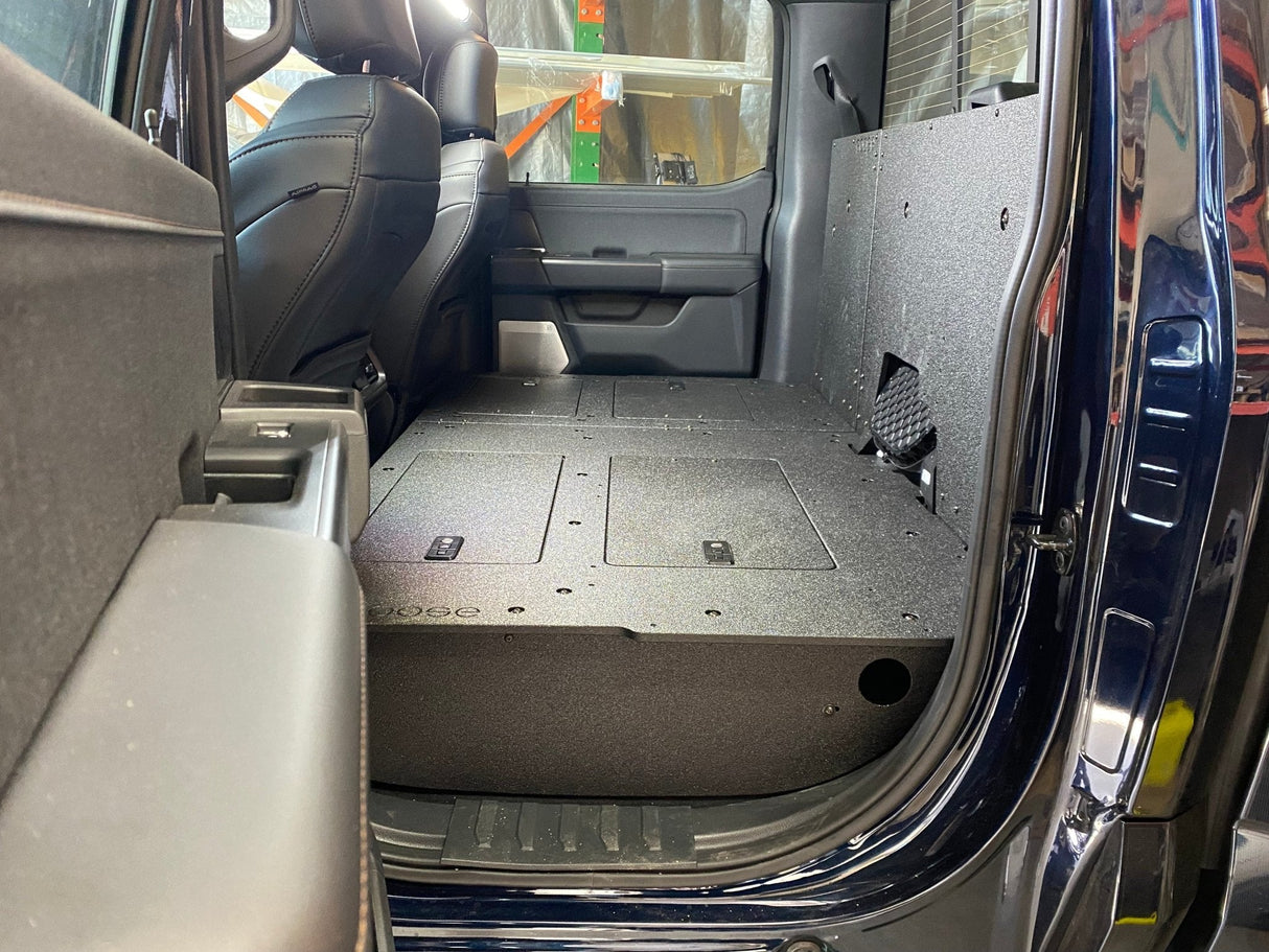 Ford Super Duty Ford - F250 - F550 - 2023 - Present - 5th Gen. Crew Cab - Second Row Seat Delete Plate System with Factory B&O Subwoofer Center Wall with Exterior Port - Xtrusion Overland