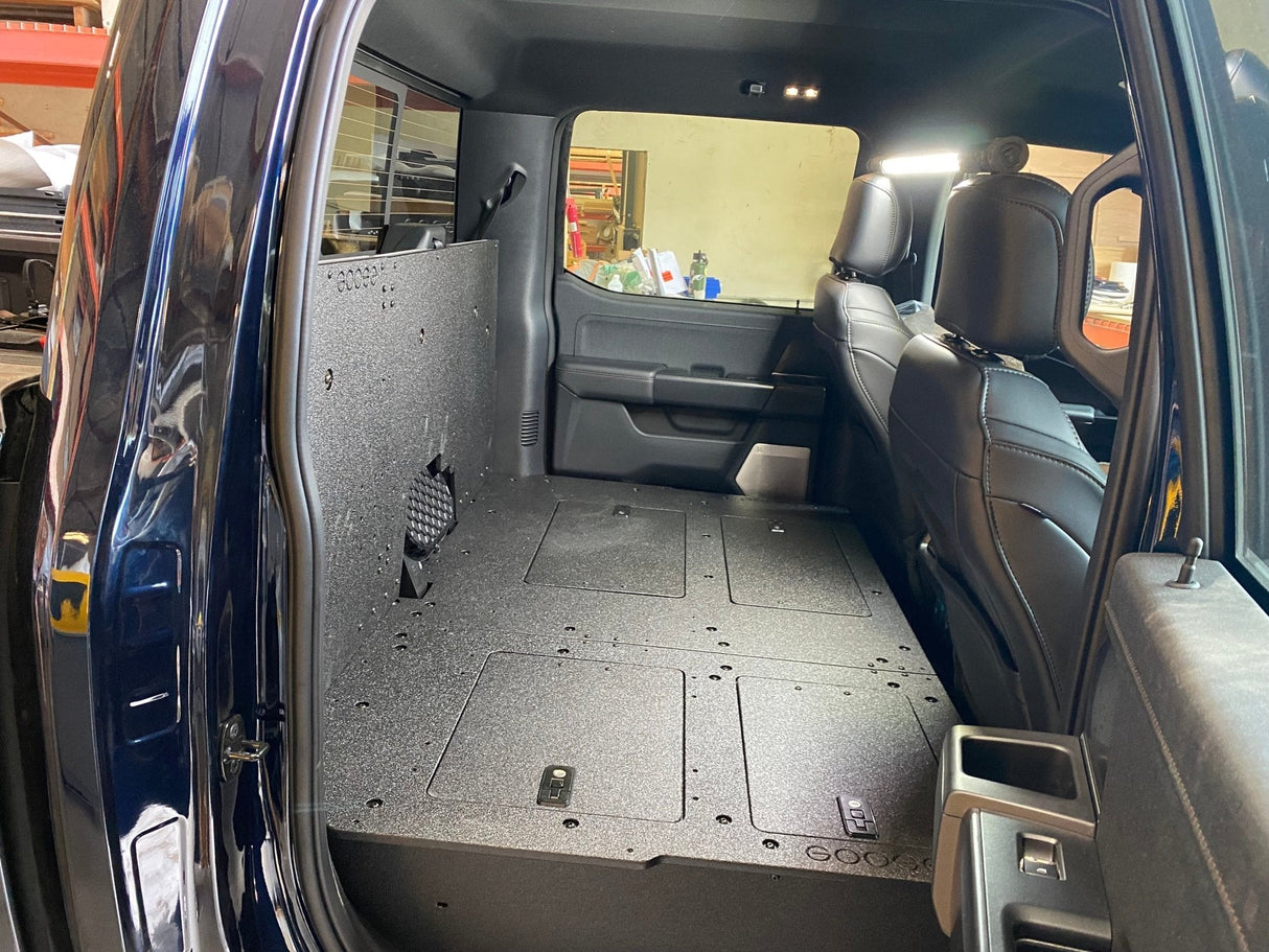 Ford Super Duty Ford - F250 - F550 - 2023 - Present - 5th Gen. Crew Cab - Second Row Seat Delete Plate System with Factory B&O Subwoofer Center Wall with Exterior Port - Xtrusion Overland