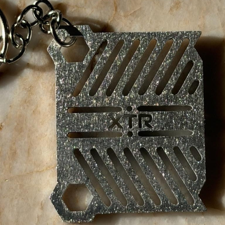 Close up of durable metal key holder for off-road use