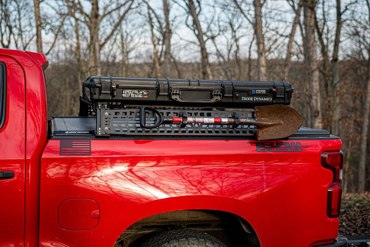 XBRS bed bars on a Silverado 1500 with a side MOLLE panel, hard case and shovel