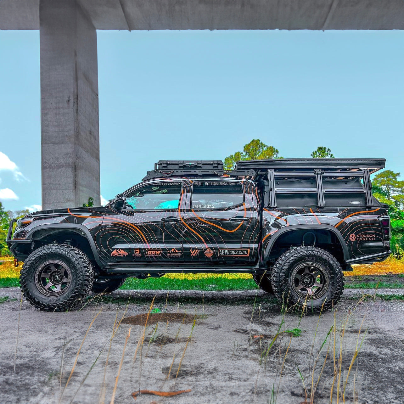 Toyota Tacoma (Tacostorm) with Xtrusion XTR3 Bed Rack and Soft Topper bed cover.