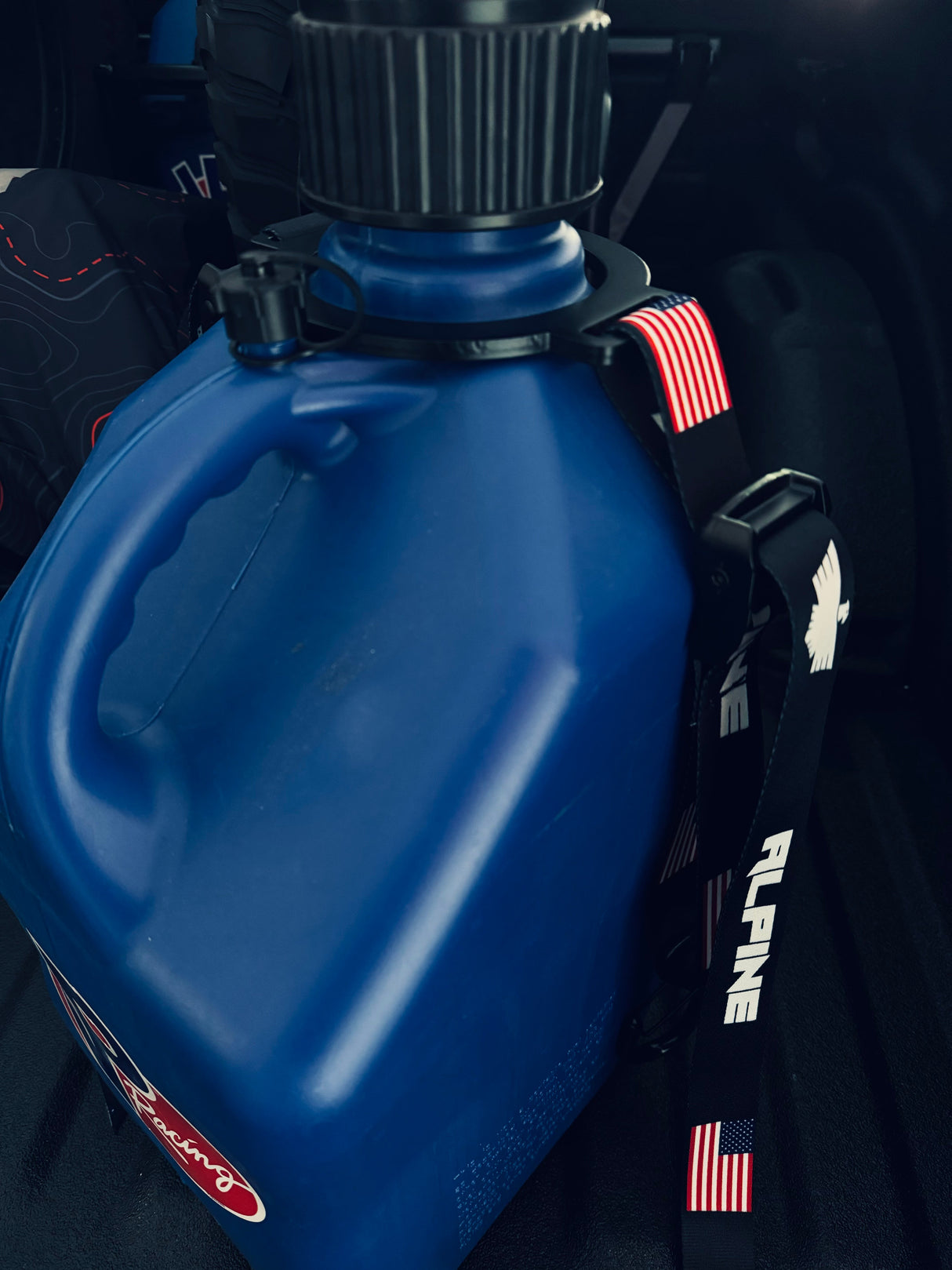 Ring Fuel Jug Strap- Alpine Flag