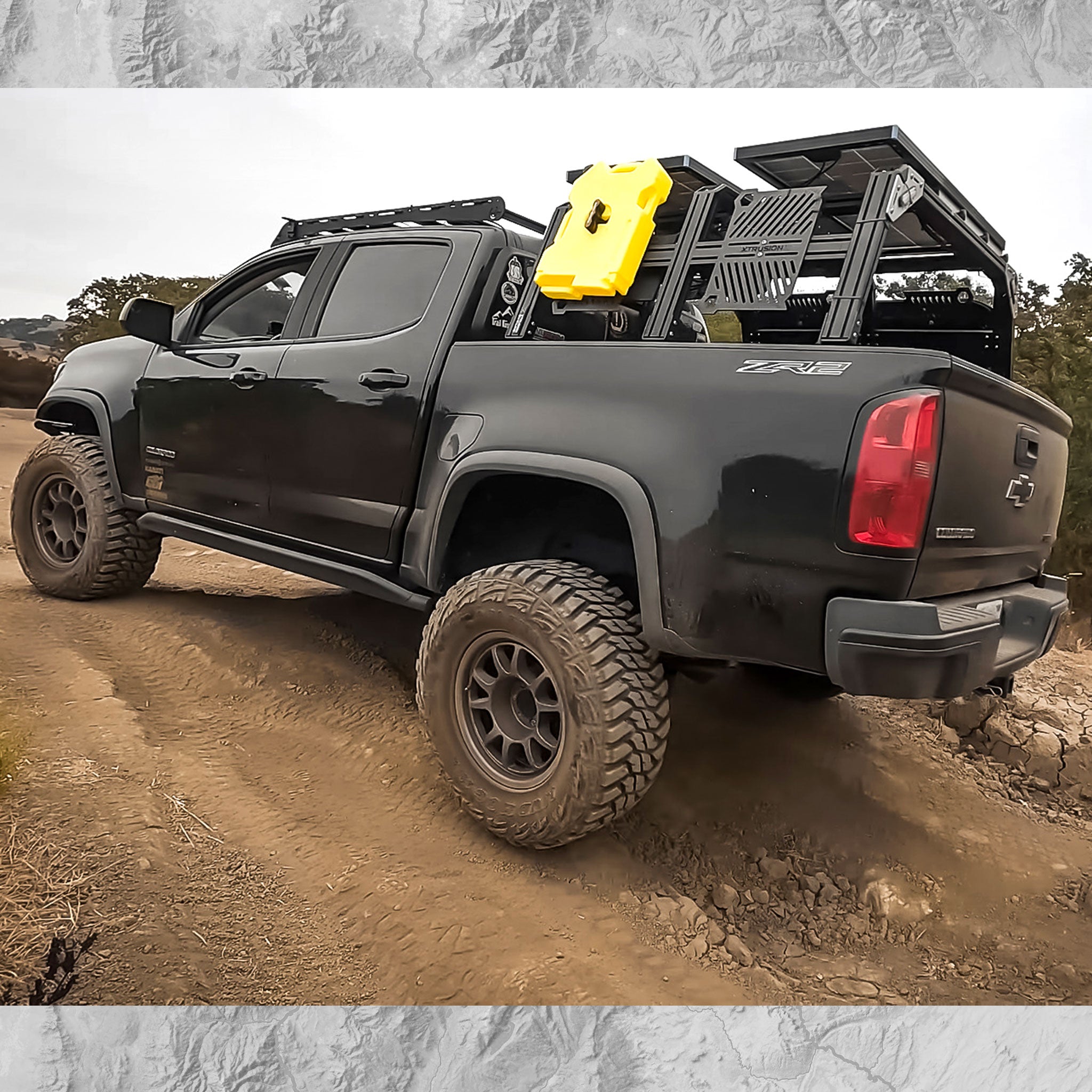 Chevy Colorado with XTR3 Overland Bed Rack, Molles, Rotopax, and Solar panels.