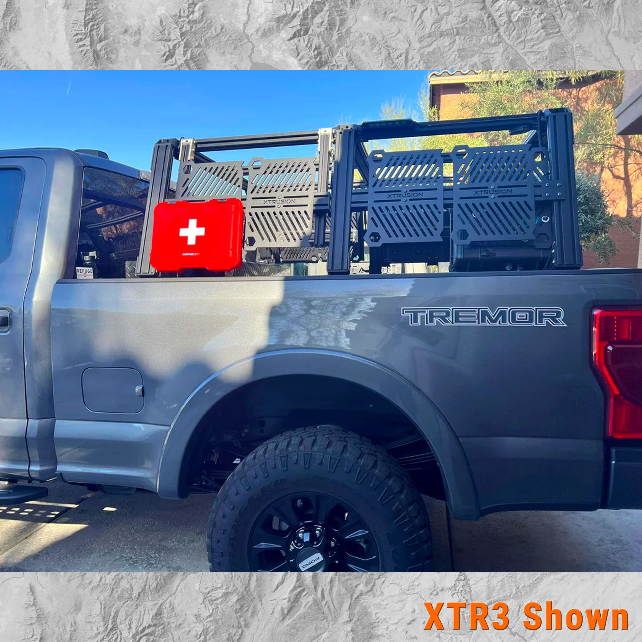 Ford F250 Superduty Tremor shown with XTR3 bed rack and mole panels with mounted first aid kit