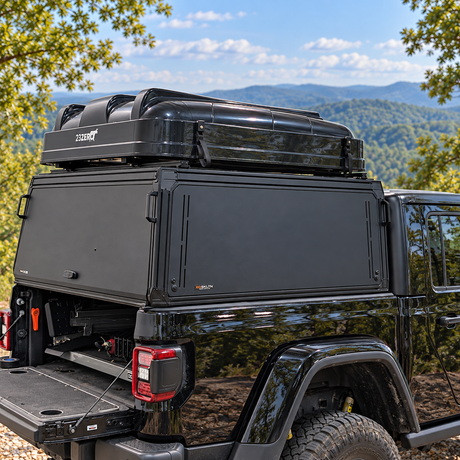 Xoskeleton view from the back with tailgate open on a black Jeep Gladiator