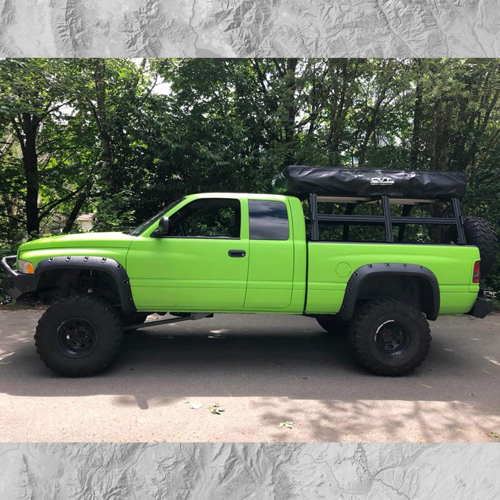 Dodge Ram with XRT3 bed rack and closed roof top tent