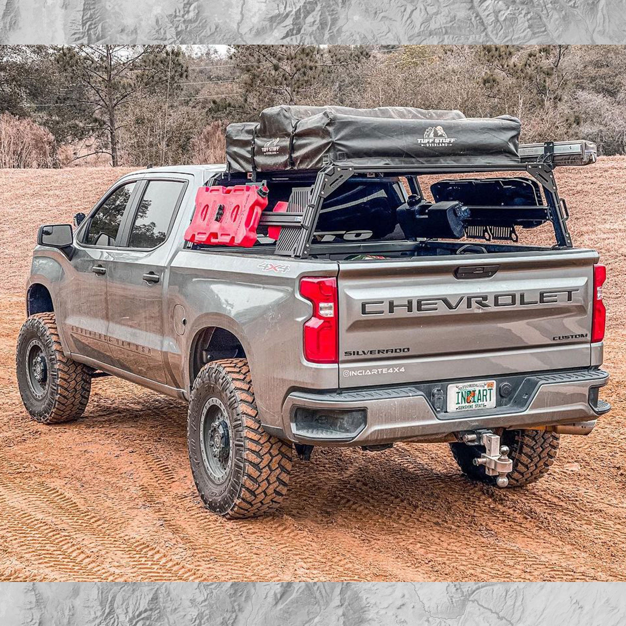 Chevy Silverado with overland bed rack and RTT with RotoPax