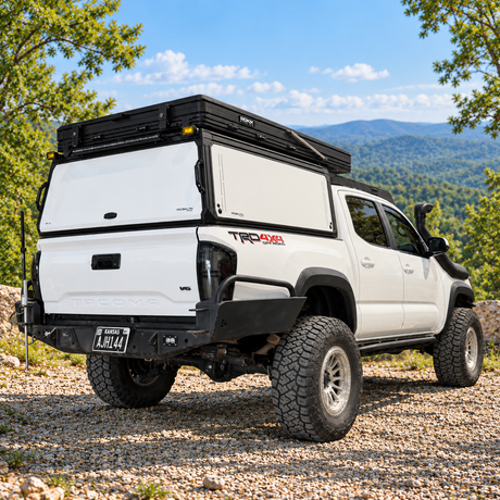 White Panels truck cap XOSKLTN topper rear view on scenic overlook