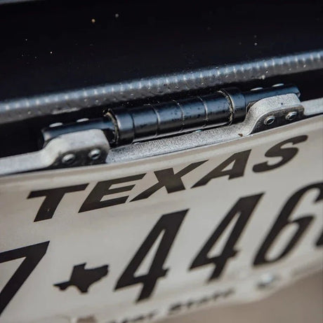 Flip up license plate bracket - Xtrusion Overland