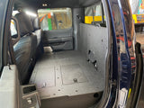 Ford - F150 2021 - Present - 14th Gen. SuperCrew - Second Row Seat Delete Plate System with Factory B&O Subwoofer Center Wall with Exterior Port - Xtrusion Overland
