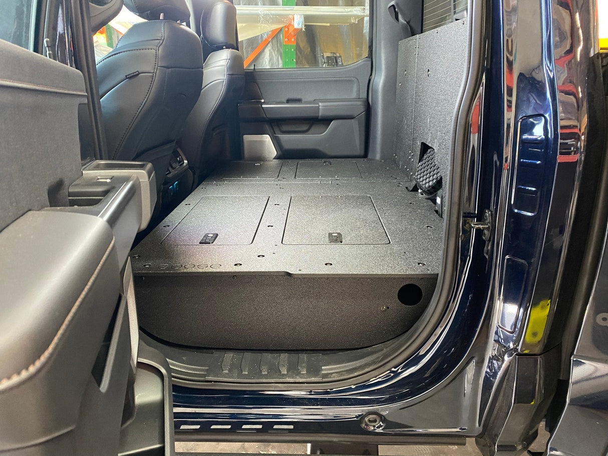 Ford - F150 2021 - Present - 14th Gen. SuperCrew - Second Row Seat Delete Plate System with Factory B&O Subwoofer Center Wall with Exterior Port - Xtrusion Overland