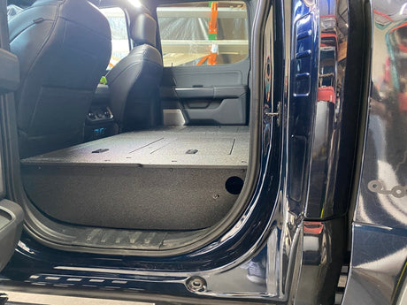 Ford Super Duty Ford - F250 - F550 - 2023 - Present - 5th Gen. Crew Cab - Second Row Seat Delete Plate System with Factory B&O Subwoofer Center Wall with Exterior Port - Xtrusion Overland