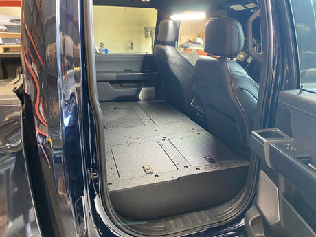 Ford Super Duty Ford - F250 - F550 - 2023 - Present - 5th Gen. Crew Cab - Second Row Seat Delete Plate System with Factory B&O Subwoofer Center Wall with Exterior Port - Xtrusion Overland