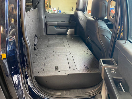 Ford Super Duty Ford - F250 - F550 - 2023 - Present - 5th Gen. Crew Cab - Second Row Seat Delete Plate System with Factory B&O Subwoofer Center Wall with Exterior Port - Xtrusion Overland