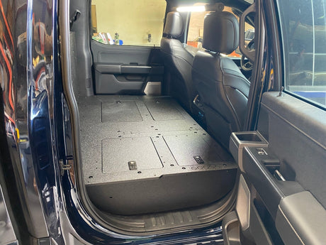 Ford Super Duty Ford - F250 - F550 - 2023 - Present - 5th Gen. Crew Cab - Second Row Seat Delete Plate System with Factory B&O Subwoofer Center Wall with Exterior Port - Xtrusion Overland