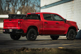 XBRS bed bars on a red Chevy Silverado 1500 Trail Boss, rear three-quarter view