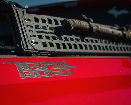 MOLLE panel on XBRS bed bars above the Trail Boss decal on a Silverado 1500