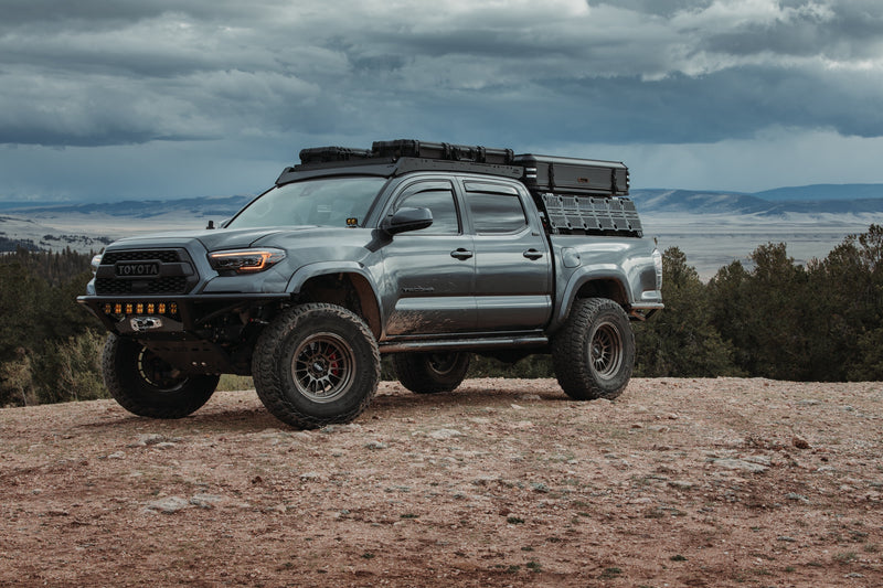 Tacoma with XTR1 bed rack on a high-desert overlook