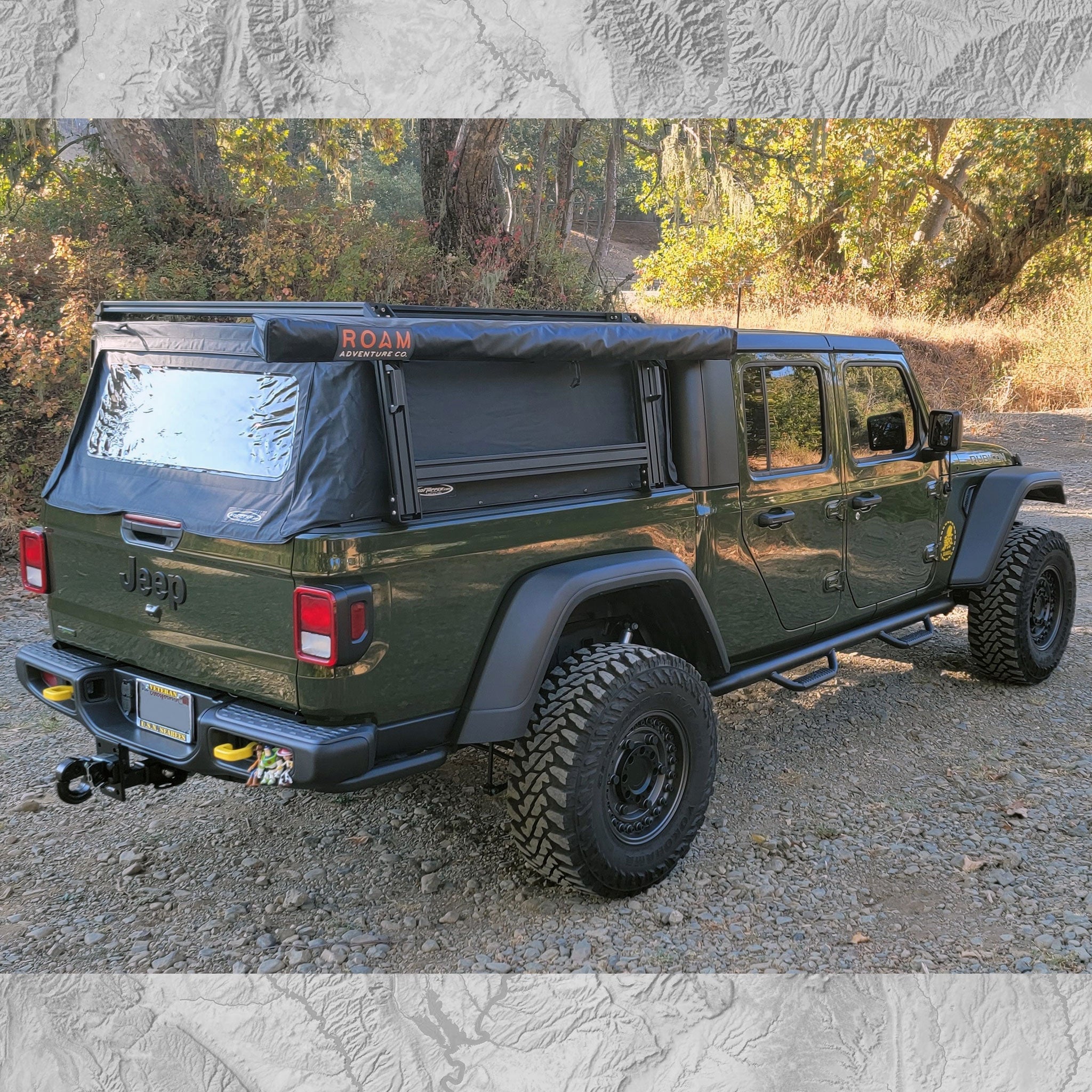 Jeep Gladiator Rubicon with XTR1 Bed Rack, Awning, and closed SofTopper.  