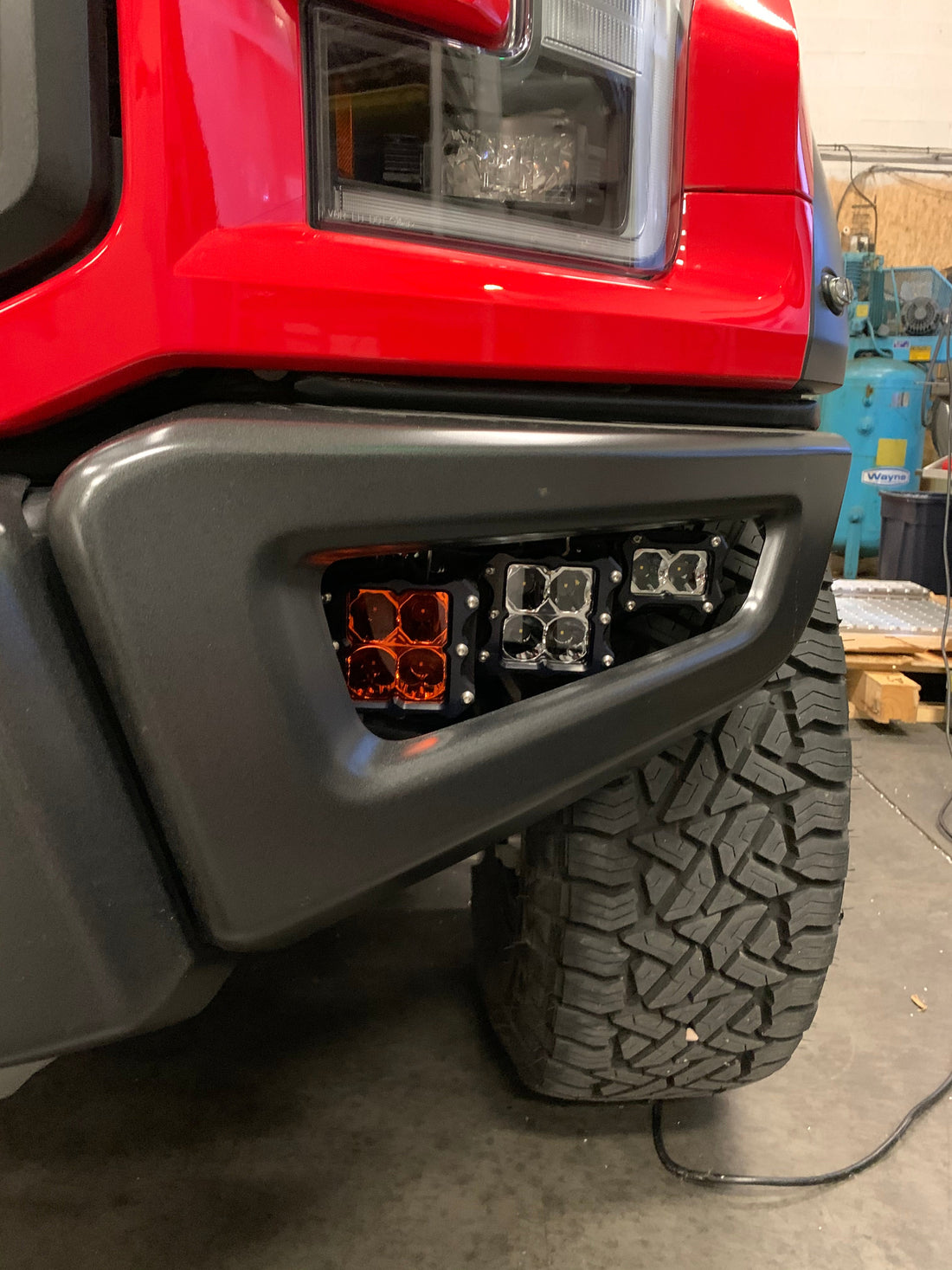 Heretic fog light kit on a ford raptor