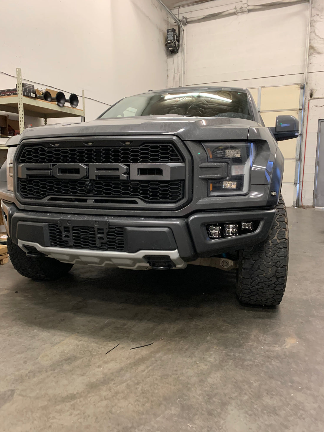 Heretic fog light kit on a ford raptor