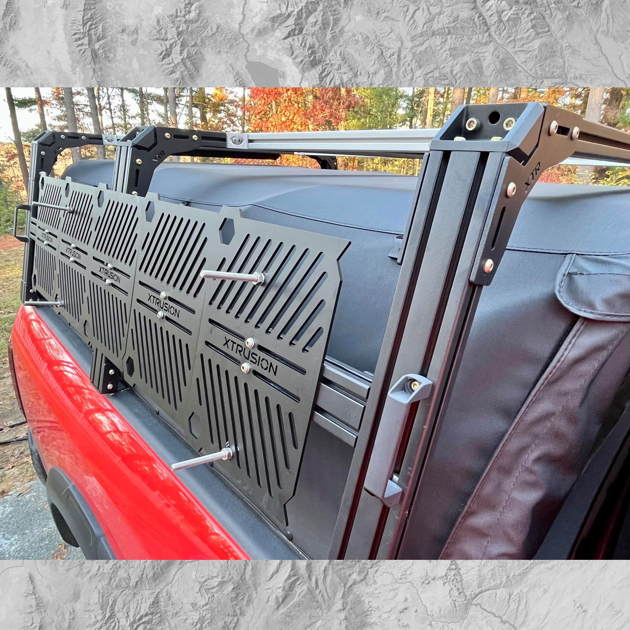 Dodge RAM 2500 XTR1 HD (Heavy Duty) bed rack build with SofTopper, equipped with HD triple column uprights, 15-inch Xtrusion Molle panels, and traction boards mounts.