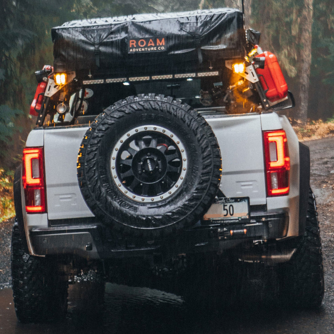 Ford Ranger with extrusion bed rack Roof top tent, off-road lights and overlanding gear